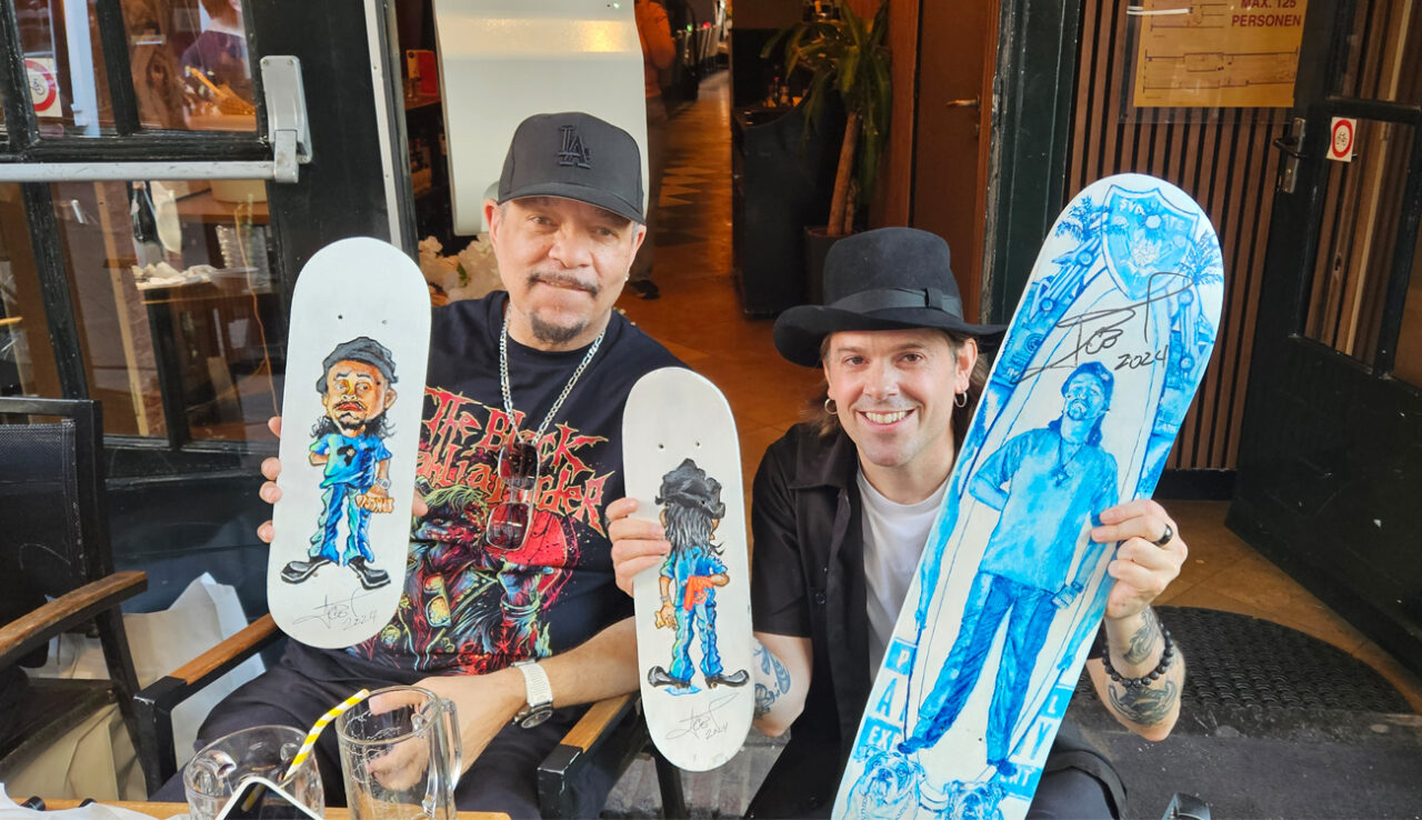 Ice-T (Tracey Marrow) and Svenimal showing skateboard painting art by Svenimal. Acrylics and oils on second hand Anti-Hero skateboard (20x80cm) and toy skateboards (13x43,5cm) @ Korte leidse Dwarsstraat, Amsterdam (2024) (svenimal.art)