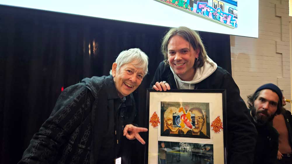With Martha Cooper giving my art prints of my graffiti portraits and a photo I made of her and Henry Chalfant (photographers of “Subway Art”) @ Stedelijk Museum, Amsterdam (2024) (svenimal.art)