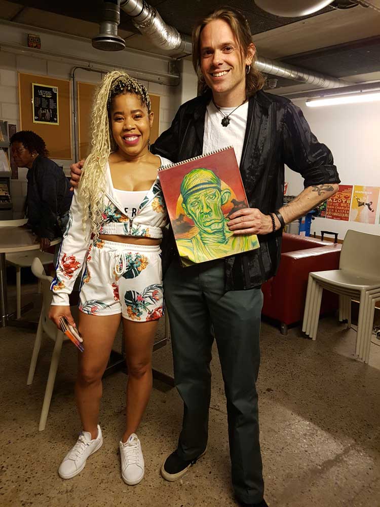 With K’reema (Kareema) (Yellowman’s daughter/singer) with Yelloman portrait drawing. Polychromos colored pencils on Strathmore Toned Tan 118 gr (27,9x35,6) @ Q-Factory (2019) (svenimal.art)